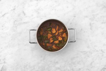 Cook veggies and make gumbo