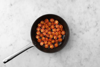 Cuocere i pomodorini