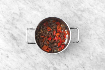 Cook chorizo and veggies