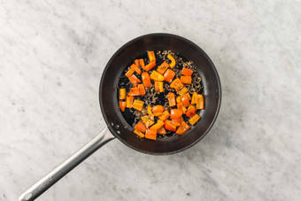 Cook sausage and veggies