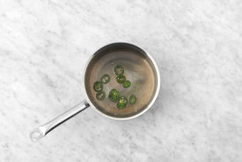 Make candied jalapeños