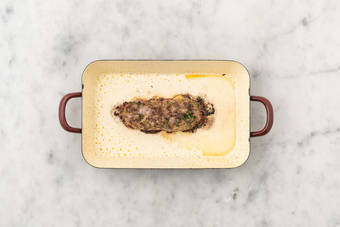 Enfourner le pain de viande