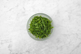 Condire la rucola