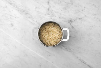 Cook noodles 
