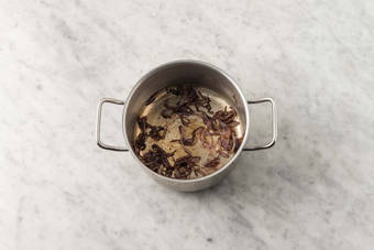 Cook bacon and caramelize onions 