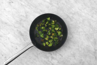 Cook salmon and cook veggies