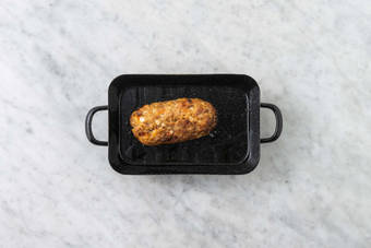 Enfourner le pain de viande