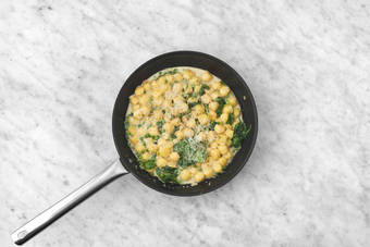 Cook gnocchi and sauce