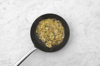 Cook bacon and caramelize onions 