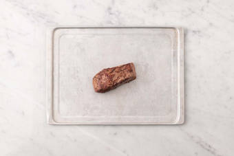 Cook steaks and finish potatoes