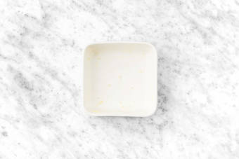 Beurrer le plat à four