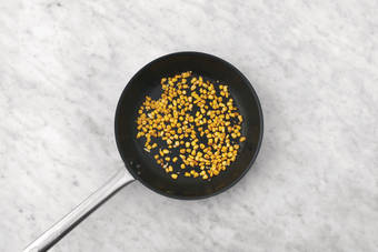 Cook the corn & cauliflower rice