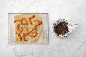 Roast the lamb and pumpkin