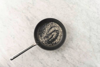 Toast sesame seeds