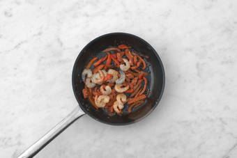 Les crevettes au chaud