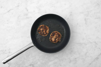 Cook bacon and patties