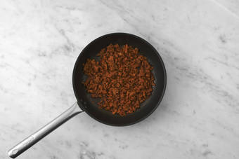 Cook the beef and diced bacon