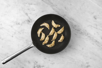 Cook the veggie gyoza