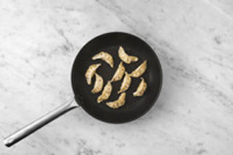 Cook the veggie gyoza