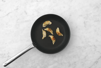 Cook the vegetable gyozas
