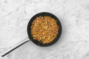 Stir-fry the rice