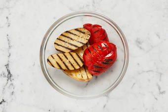 Grill potatoes and peppers