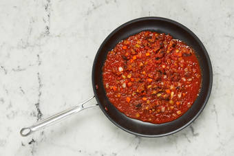 Boil water and make sauce