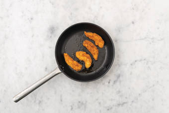 Cook the plant-based crumbed chick'n & bacon