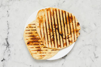 Grill chicken and flatbreads