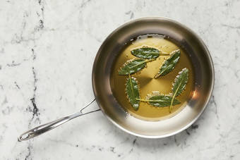 Fry sage and prep halloumi