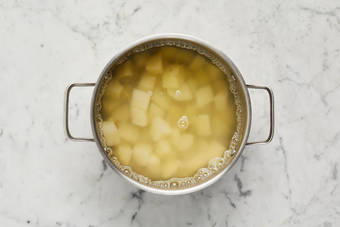 Warm beef and prep potatoes