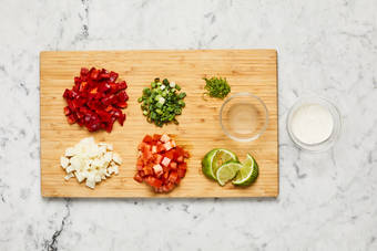 Prep veggies and make lime crema