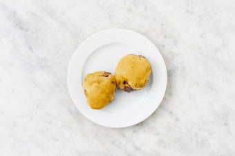 Grill onions and Beyond Meat® patties