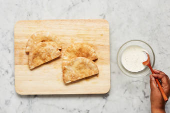 WARM PITAS & MAKE SAUCE