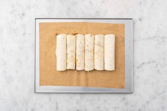 Assemble and roll taquitos