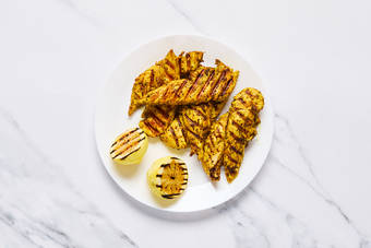 Grill lemon and chicken