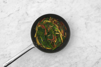 Stir-fry the veggies 