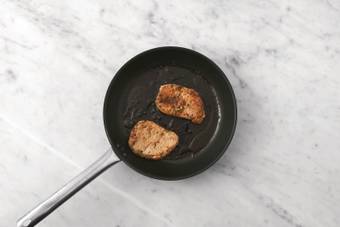 Cook the pork steaks