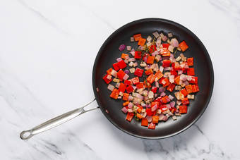 Toast almonds and cook veggies