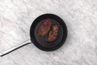 Cook the steak & prawns