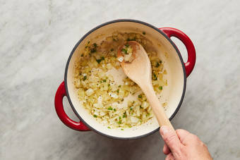 Cook onions and jalapeños