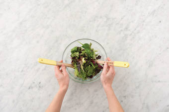 Dress the salad leaves