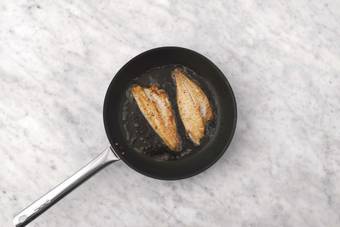 Cook the dory & prawns