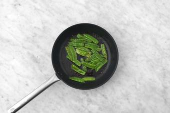 Finish mash and blister snap peas