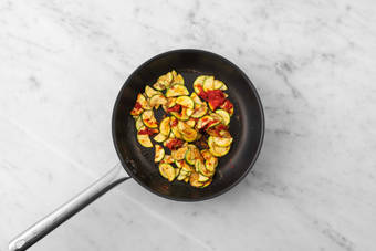 Cook bacon and zucchini