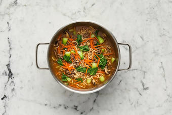 Make broth and cook noodles