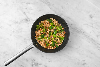 Cook the spiced beans & veggies 