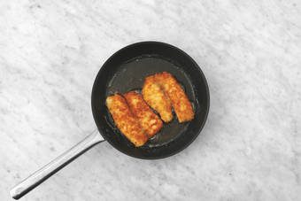 Cook the crumbed fish