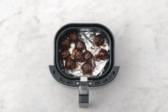 Make the meatballs & cook the prawns