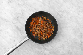 Cook sausage and peppers